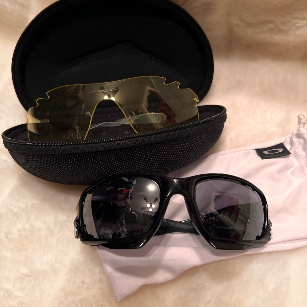 Authentic Oakley sunglasses with two different lenses